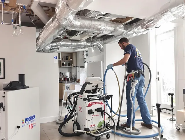 Rehoboth Air Duct Cleaning technician performing advanced pure duct cleaning with specialized equipment in Rehoboth